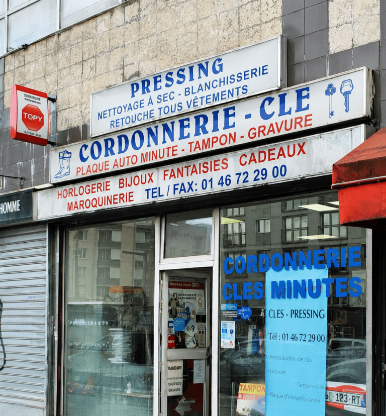 Façade d’Eric Cordonnerie à Vitry-sur-Seine spécialisée en cordonnerie, reproduction de clés et pressing