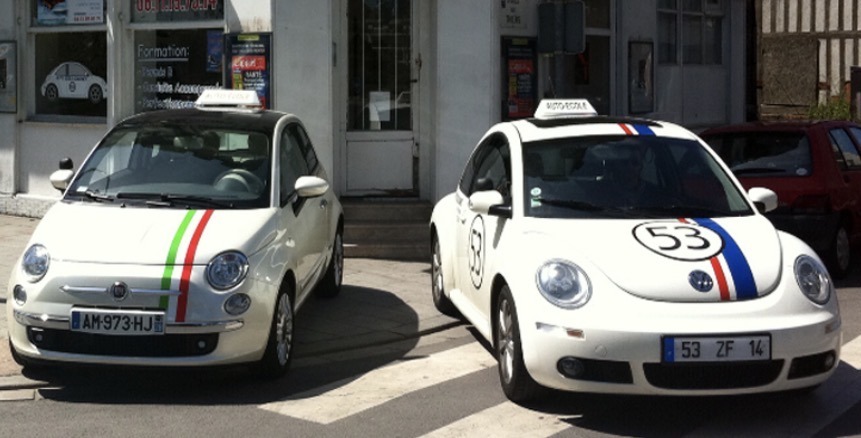 Voitures devant auto école